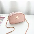 Pink faux leather crossbody bag featuring star embroidery and metallic tassel detail - Pink