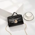 Elegant black crocodile pattern handbag with gold metal lock and fine chain strap - Black