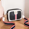 Black leather camera bag with tricolor stripe decoration and wide shoulder strap - Black