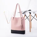 Pink and black color-block tote bag with tassel charm and slim shoulder straps - Pink