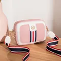Pink and white patchwork crossbody camera bag with striped ribbon strap and gold logo - Pink