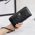 Elegante schwarze gesteppte lange Geldbörse für Damen mit goldenen Details und Schlaufe - Schwarz