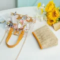 Sac seau transparent en PVC à motif marguerites avec pochette paille et anses jaunes - Jaune