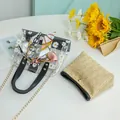 Sac seau transparent avec imprimé marguerites et pochette intérieure en paille - Noir