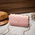 Pink quilted shoulder bag with golden chain strap and circular metal buckle detail - Pink