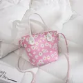 Petit sac seau rose à imprimé marguerite avec poignée et bandoulière femme - Rose