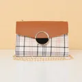 Classic checkered crossbody bag with brown leather flap and golden chain strap - Brown