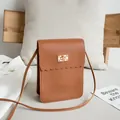 Brown PU leather crossbody phone bag featuring scallop edges and gold rivet buckle - Brown