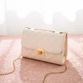 Beige quilted PU leather crossbody bag with gold chain strap and turn-lock closure - Off White