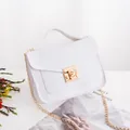 White lizard pattern crossbody bag with gold chain strap and square buckle closure - White