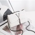 Elegant white quilted crossbody bag with a metal V logo and stylish chain strap - V-Pattern White