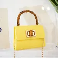 Bright yellow mini crocodile embossed crossbody bag with retro bamboo handle and chain - Yellow