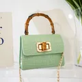 Mint green crocodile pattern mini bag with bamboo handle and gold chain strap - Light Green