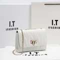 Elegant white quilted chain shoulder bag with golden square lock and V-stitch pattern - White
