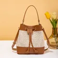Sac seau bicolore en cuir marron et tissu beige avec bandoulière réglable - Brun