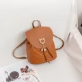 Brown quilted PU leather backpack featuring cat-ear ring buckle and pearl pendant - Brown