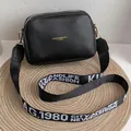 Black rectangular crossbody camera bag with gold lettering and stylish wide fabric strap - Gold Stamping Black
