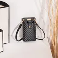 Vertical black crossbody phone bag with grey circular patterns and gold hardware - Monogram Print Style / Black