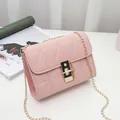 Pink quilted crossbody bag with triangle pattern, gold chain strap and metal buckle - Pink