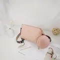 Pink quilted crossbody bag with small pouch and LOVE patterned woven shoulder strap - Pink