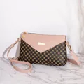 Pink and brown contrast square shoulder bag with golden hardware and circular patterns - Pink