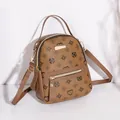 Kleiner brauner Damenrucksack im Vintage-Druck mit Kleemuster und Goldbeschlägen - Braun