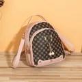 Mini mochila marrón monograma con ribete rosa y anillo metálico de gato con perlas - Rosa