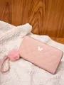 Pink quilted long wallet featuring butterfly hardware and fluffy pom pom wristlet strap - Pink