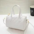 White quilted barrel crossbody bag in soft PU leather with golden metal hardware - White