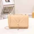 Beige quilted shoulder bag with V-shaped stitching and golden metal fringe tassel - Khaki