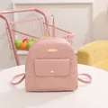 Pink mini backpack for women featuring 3D floral embossing and a stylish PU leather finish - Pink