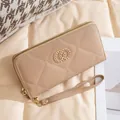 Quilted long wallet for women in apricot with gold chain decor and wrist strap - Khaki