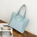 Mint blue quilted tote bag with gold hardware and flower pendant on PU leather - Blue
