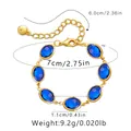 Elegant gold bracelet featuring oval blue glass crystals with adjustable link chain - Deep Blue Oval Drill Style (KB0456-1)