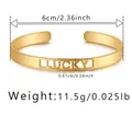 Detailierte Größenmessung eines goldfarbenen Lucky-Manschettenarmbands mit Maßen und Gewicht - Lucky Stil