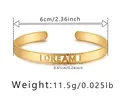 Detailansicht des goldenen Armreifs mit DREAM-Schriftzug und Maßangaben in Millimeter - Dream-Stil
