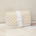 Mini white wallet with yellow clover lattice pattern and secure buckle strap detail - White