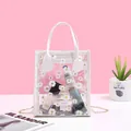 Clear PVC daisy print crossbody handbag with white handles and a delicate gold chain strap - White