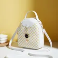 Mini white backpack with yellow circular pattern and black cat charm accessory - White