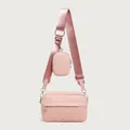 Pink quilted crossbody bag with matching mini purse and silver hardware details - Pink