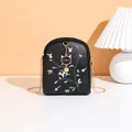Black leather mini crossbody bag with pink flower embroidery and cat metal charm - Black