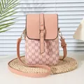 Pink crossbody phone bag with letter M pattern and adjustable gold-tone strap - 21*9*13 / Pink