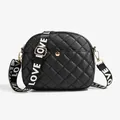 Black quilted crossbody camera bag with gold buckle and LOVE printed wide strap - Black