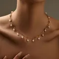 Elegant 18K gold plated rope chain necklace featuring hanging white teardrop ABS pearls - Waterdrop Pearl Necklace (KN0374)