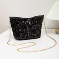 Sparkly black sequin bucket bag with elegant gold chain strap for party fashion - Black