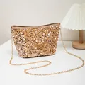 Fashionable gold sequin bucket bag with elegant chain strap for casual shoulder wear - Gold
