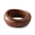 Macro detail of thick acrylic bangle featuring a brown marble texture and glossy finish - Chocolate Brown Marble Style (AB0046-2)