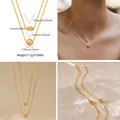 Double-layered 18K gold plated necklace with polished beads and adjustable chain details - Double Layer Round Bead Style (KN0409) / 18K Gold