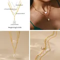 Double-layered 18K gold plated paperclip chain necklace with white teardrop charms - Paperclip Drop Artificial Pearl Double Layer Style (KN0411) / 18K Gold