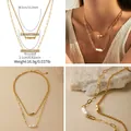 Double-layered 18K gold plated necklace featuring a baroque pearl and metallic bead - Paperclip Baroque Artificial Pearl Double Layer Style (KN0535) / 18K Gold